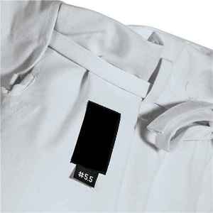 ชุดเทควันโดคลาสสิกเหมาะสำหรับผู้เริ่มต้นและผู้ปฏิบัติงานขั้นสูงด้วยผ้าที่ทนทานและการเคลื่อนย้ายที่ราบรื่น - Product Image 5