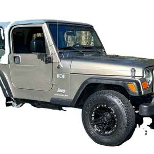 2024 X 4x4 Volante a la Izquierda Asientos de Cuero Sin Reserva Transmisión Manual de 5 Velocidades Motor de 6 Cilindros y 4.0 Litros Trasero Mayormente sin Modificaciones - Product Image 1