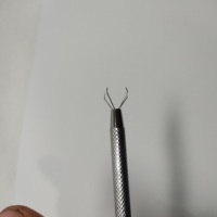 Pince à billes à 4 griffes en acier inoxydable étanche pour l'élimination et l'insertion de perles de piercing corporel