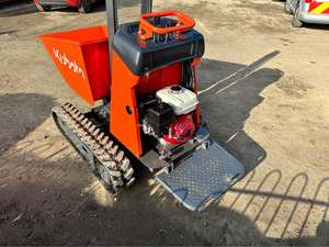 Durable Kubota <b>tracked</b> compact dumper capable of handling steep slopes and uneven terrain for construction landscaping - Product Image 6