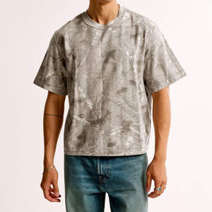 T-shirt à épaules tombantes tendance, coupe décontractée, tissu doux au toucher pour un style décontracté et un usage quotidien confortable - Product Image 1