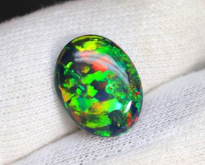 Superbe pierre précieuse d'opale noire éthiopienne Gemmes d'opale noire en vrac Glowing Welo Multi Flashy Cabochon noir éthiopien Cadeau pour elle - Product Image 1