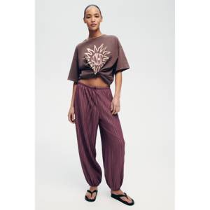Pantalon décontracté avec tissu gaufré et jambes ballon, style harem respirant - Product Image 1