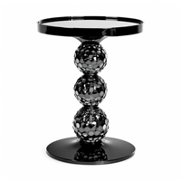 Table d'appoint sculpturale noire haut de gamme Table ronde brillante en métal pour intérieurs modernes