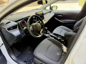 Toyota Corolla... XII 2023, Bajo Kilometraje, Caja de Cambios Automática, Volante a la Izquierda, Neumáticos R20, Estado Oscuro - Product Image 3