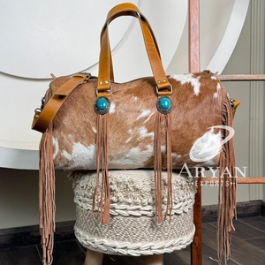 Nuevo diseño de moda personalizado de cuero de vaca genuino flecos bolsas de lona con manga de carro bolsas de viaje de gran capacidad para Unisex - Product Image 1