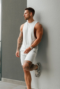 เสื้อกล้ามถักผ้าฝ้ายรูเข็มสำหรับผู้ชายเสื้อกีฬาแขนกุดทรงหลวมโลโก้ตามสั่งแห้งเร็วสำหรับฤดูร้อน - Product Image 2