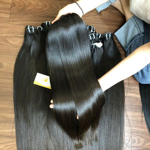 Venta al por mayor 100% de doble hueso máquina de encaje recto de doble trama estilo virgen ondas Remy grado vietnamita extensiones de cabello humano - Product Image 1