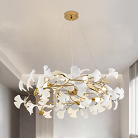 Lustre moderne en forme de feuille de ginkgo dorée, luminaire suspendu en verre blanc pour salon, chambre et salle à manger, décoration de luxe.