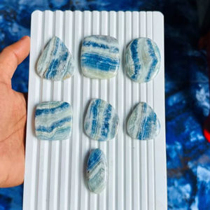พลอยเชลไลท์สีน้ำเงินคุณภาพสูง รูปทรงหลังเบี้ย  โรโดโครไซต์สีน้ำเงินธรรมชาติ  หินกึ่งมีค่าแบบหลวม  สำหรับงานออกแบบ  ราคาโรงงาน - Product Image 4