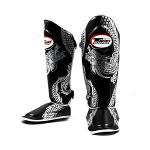 Espinilleras Gemelas de la Mejor Calidad Hechas de Cuero Genuino con Diseño Personalizado, Logotipo a Color y Correa Ajustable con Cierre de Gancho y Bucle para Muay Thai - Product Image 6