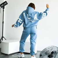 Ensemble jogging deux pièces pour femme en tricot d'automne avec logo personnalisé sur le devant, comprenant un sweat à capuche et un pantalon de survêtement