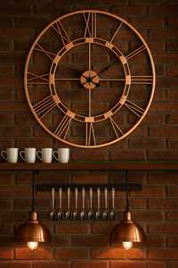 Horloge murale analogique en métal à chiffres romains, silencieuse, sans tic-tac, design vintage Art Déco, finition or rose pour la décoration du salon (à piles) - Product Image 5