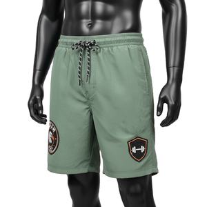 กางเกงว่ายน้ำชาย 150 GSM แห้งเร็ว โพลีเอสเตอร์ไมโครไฟเบอร์ สีเขียวมะกอก เอวยางยืด ปักโลโก้ตามสั่ง - Product Image 4