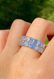 Top Trending GRA Certified Round Moissanite Diamond 925 Sterling Silver Iced Out Tennis Band Ring para mujeres a precio al por mayor - Product Image 2