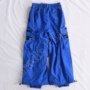 Pantalones de esquí de nieve Cargo impermeables azules para hombre al por mayor con múltiples bolsillos cintura elástica y parte inferior ajustable - Product Image 2