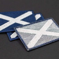L'écusson du drapeau écossais, le drapeau du pays de l'Écosse, l'emblème national de la croix de St Andrew, le fer brodé sur