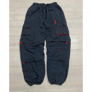 Pantalon multi-poches ample unisexe, pantalon cargo ample, coupe-vent, taille élastique, ceinture réglable, fermeture éclair, jambe large, couleur noire - Product Image 1