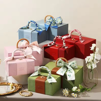 Boîte cadeau rose de luxe pour femmes avec poignée et emballage haut de gamme pour vêtements de mariée et de bébé