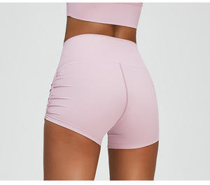 Pantalones cortos de yoga plisados laterales Pantalones cortos de motorista deportivos para correr Levantamiento de cadera elásticos Pantalones cortos de entrenamiento de verano para mujer personalizados con logotipo personalizado - Product Image 1