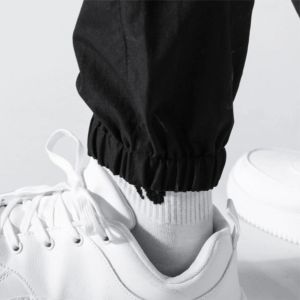 กางเกงสเวตเตอร์ขาสั้นผ้าโพลีเอสเตอร์/ ผ้าฝ้ายแบบหลายกระเป๋าเอวปานกลางทรงพอดีตัวปกติปักลายลำลองสีขาวสีดำ - Product Image 6