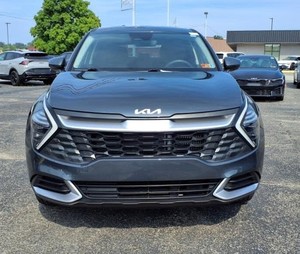 สีเทาสะอาด2025 Kia Sportage HYBRID LX AWD ใช้กับเบาะผ้าแพคเกจพรีเมี่ยมระบบนำทางบลูทูธซันรูฟ - Product Image 1