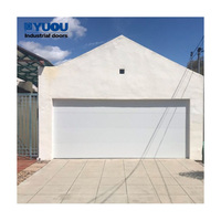 Puerta de Garaje Residencial Blanca, Proveedor de Puertas Seccionales Metálicas Personalizadas y Aisladas