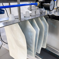 Machine de remplissage et de bouchage automatique multifonctionnelle de poches souples pour liquides, savon, détergent, et sachets Doypack/stand-up