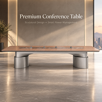 Table de conférence de luxe avec base sculpturale et plateau en pierre frittée pour salle de réunion dirigeante
