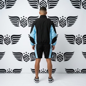 เสื้อแจ็คเก็ตบอมเบอร์สปอร์ตสีดำและน้ำเงินสำหรับผู้ชาย ยี่ห้อ Off the Radar พร้อมซิปและกางเกงขาสั้นเข้าชุด ผ้าฟลีซกันลม สำหรับฤดูใบไม้ร่วง - Product Image 5