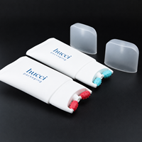Tube de massage pour crème corporelle en plastique PE blanc personnalisé de 150 ml avec bille roulante en silicone
