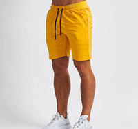 Nouveau design – Short de sport décontracté pour homme avec poches en mesh, double couche, taille haute, respirant, imperméable, pour l'entraînement, jogging, compression, couleur unie