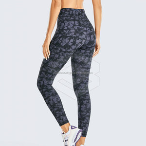 Pantalones de yoga para mujer con realce de glúteos de alta calidad con cintura cruzada sin costuras Leggings de cintura alta con agujeros Leggings de Yoga de grado superior - Product Image 3