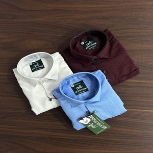 Vente en gros de chemises unies décontractées à manches longues pour garçons, agrafe de garde-robe essentielle avec fonction de séchage rapide, conception propre - Product Image 1