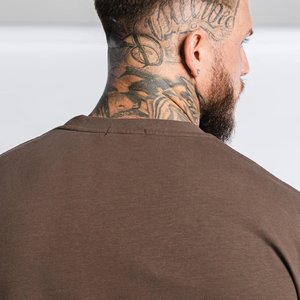 T-shirt actif surdimensionné de style nouveau pour hommes et femmes, vêtements de sport décontractés, coton uni, séchage rapide, manches courtes - Product Image 5