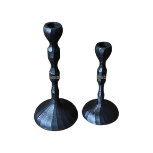 Portavelas de latón de diseño único con acabado negro, perfecto para fiestas, bodas y decoración de eventos a precios asequibles - Product Image 1
