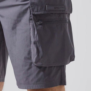 Shorts décontractés pour hommes, coupe confortable et respirante, coupe classique et décontractée, fermeture à boutons, avec poches latérales, vente en gros - Product Image 2