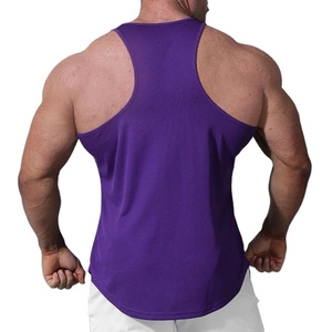 Venta al por mayor de tops deportivos tipo camiseta sin mangas para gimnasio y fitness, de color liso, con bajo curvo y diseño recortado, muy vendidos. - Product Image 5