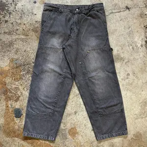 กางเกงยีนส์ทรงแบ็กกี้ขาตรงเอวสูงผ้าเดนิมเนื้อหนาแบบคัสตอม ดีไซน์สองชั้นที่เข่า สำหรับผู้ชายและผู้หญิง ผลิตจากผ้าฝ้าย 100% ซักเคมี - Product Image 2