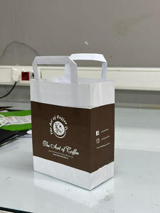 Vente en gros de sacs d'épicerie en papier kraft brun imprimé de logo personnalisé avec poignée plate pour l'emballage et l'emballage des aliments - Product Image 4