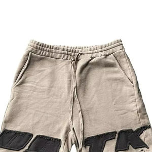 กางเกงขาสั้นผ้าฟลีซสีทึบสำหรับชายและหญิงผ้าคอตตอนสีพื้นทันสมัยปักลายสบายๆแสงแดดจางหายไป - Product Image 3