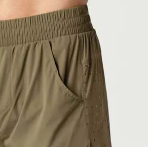 กางเกงขาสั้นผ้าฝ้ายสำหรับทุกเพศดีไซน์เรียบสำหรับผู้ชายและผู้หญิงผู้ผลิตสินค้าจำนวนมาก - Product Image 6