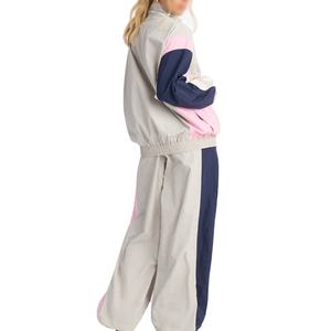 Conjunto deportivo cortavientos extragrande para mujer OEM, chaqueta con cremallera y pantalones anchos, conjunto deportivo cortavientos con bloques de color. - Product Image 2