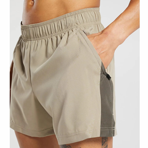 กางเกงขาสั้นเล่นยิมสำหรับผู้ชายกางเกงวิ่งแบบลำลองมีกระเป๋าระบายอากาศได้ดีมีซิปเอวยางยืดปิดสีพื้น - Product Image 3