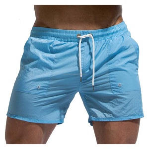 กางเกงขาสั้นบอร์ดแห้งเร็วของผู้ชายกางเกงว่ายน้ำผ้าตาข่ายซับในมีกระเป๋าและเชือกถักแบบปรับได้ - Product Image 1