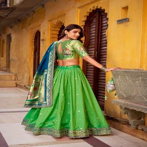 Hermoso Lehenga Choli de Seda Suave Paithani con Trabajo de Tejido Zari, Lentejuelas, Bordado con Hilo y Borde de Encaje Festoneado - Product Image 1