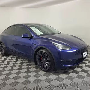 2024 Tesla Model Y Performance AWD Véhicule électrique d'occasion Boîte de vitesses automatique Sièges en cuir Toit ouvrant panoramique Arrière Foncé - Product Image 1