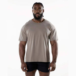 Streetwear décontracté pour hommes T-shirt de sport coupe ample léger de couleur unie T-shirt d'entraînement de musculation épaule tombante douce haut peigné - Product Image 1