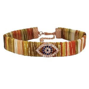Bracelet en tissu perlé fin en forme d'oeil Design élégant du mauvais œil - Product Image 1