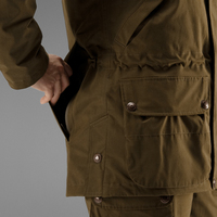 Manteau long d'hiver à coquille souple personnalisé pour femmes avec col montant imperméable et plusieurs poches pour le matériel de chasse au canard en plein air